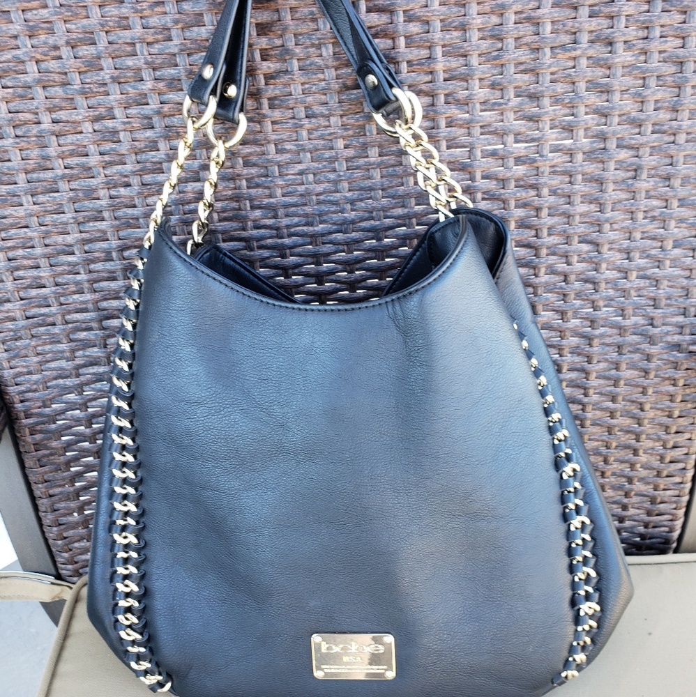 Black BeBe purse with gold chain accent